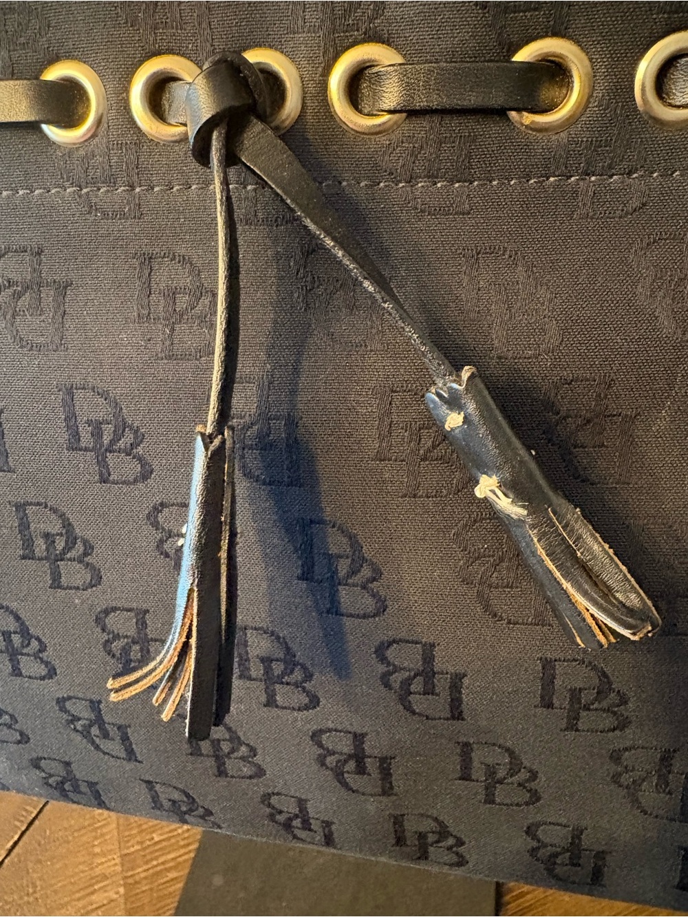 Dooney & Bourke Black DB Logo Drawstring Satchel with Gold Hardware - Picture 2 of 9